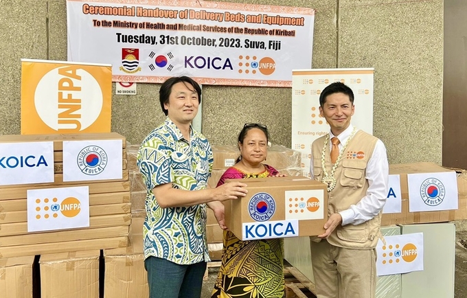 Mr. Iori Kato, UNFPA Director for the Pacific, together with Mr. Kapchae Ra, Country Director of KOICA Fiji Office (left)