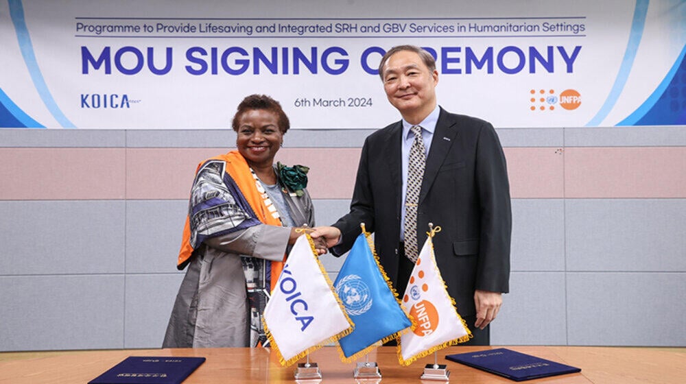 Dr. Natalia Kanem, UNFPA Executive Director and Mr. Chang Won Sam, President of KOICA, sign a three-year agreement to meet the n